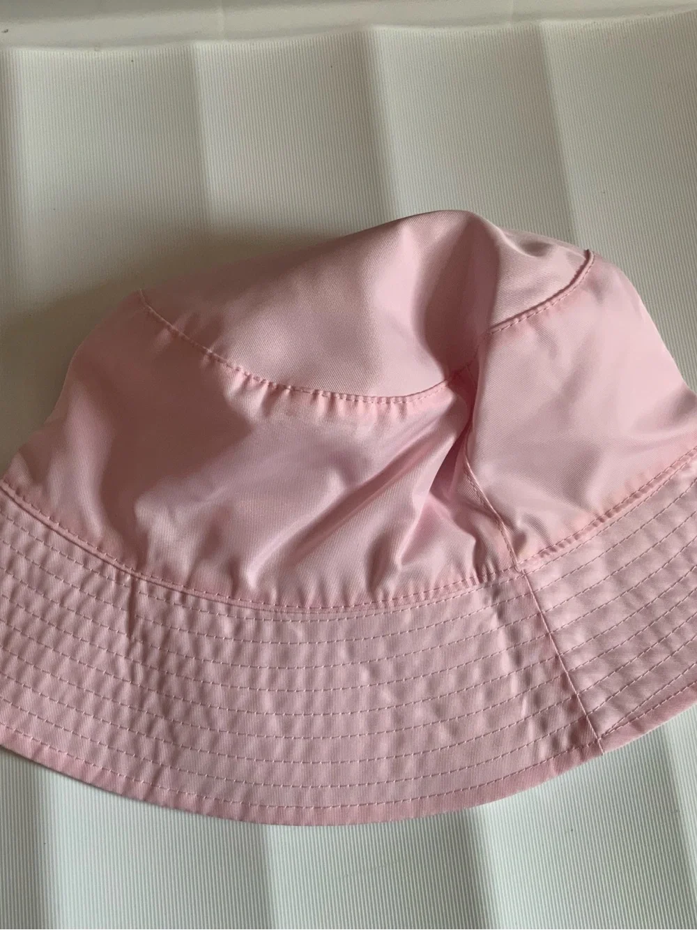 Stoney Clover Lane White/Pink Bucket Reversible Hat with Subtle Logo Tag